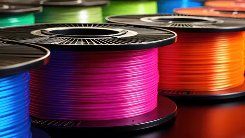 Multicolored filaments of plastic for printing on 3D printer close-up. Spools of 3D printing motley different colors thermoplastic filament. Motley ABS wire plastic for 3d printer. Additive technology